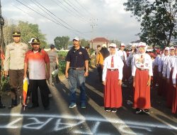 Ratusan Regu Gerak Jalan Adu Kompak di Perayaan HUT ke-80 RI Kecamatan Guluk-Guluk